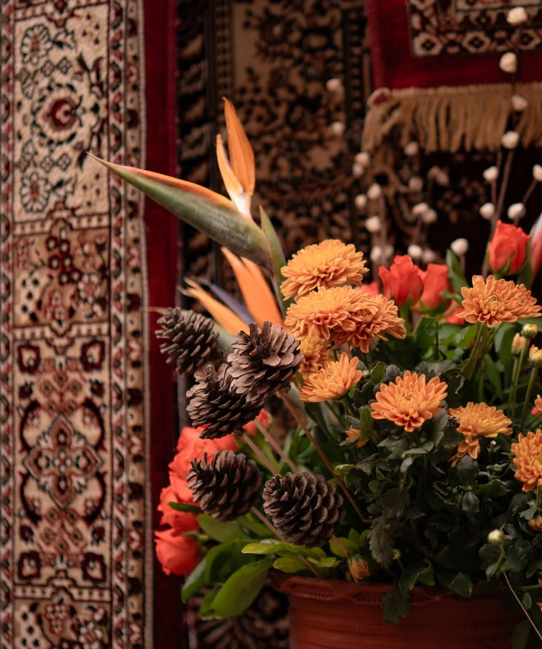 Birds of paradise and marigold floral arrangement at a Masala Chowk-themed mehendi ceremony in Alsisar, Rajasthan